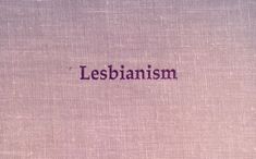 an old book with the words lesbianism written in purple ink on top of it