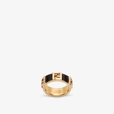 Band ring with embossed FF motif. Made of gold-finish metal. Embellished with black enamelled details. Made in Italy. Size S Black Metal Rings, Fendi Ring, Gifts Holiday, Color Oro, Black Enamel, Metal Rings, Band Ring, Gold Finish, Black Metal