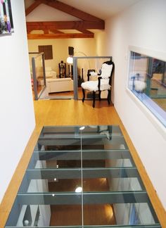 a glass floor in the middle of a room