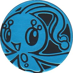 an image of a blue and black fish ornament on a white back ground