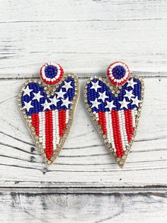 These Earrings are in the shape of hearts and decorated in red, white, and blue beads! Blue Patriotic Earrings For Independence Day, Patriotic Blue Earrings For Independence Day, Red Patriotic Beaded Earrings, Patriotic Blue Drop Earrings, Blue Patriotic Drop Earrings, Patriotic Beaded Earrings For 4th Of July, Patriotic Blue Beaded Earrings, Patriotic Multicolor Earrings For Independence Day, Beaded Earrings For 4th Of July Gift