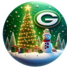 a green bay packers christmas ornament with a snowman in front of a christmas tree