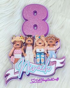 a birthday cake topper with the number eight on it and three girls in dresses