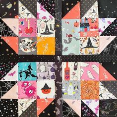 a patchwork quilt with halloween designs on it