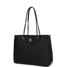 This Timeless tote bag is made of black caviar with silver tone hardware; featuring the CC signature turnlock, rear exterior slip pocket and interwoven silver tone chain link and black leather shoulder straps. The interior is lined in black fabric and has two open pockets on the front wall and a zipper pocket with a Chanel pull on the rear wall. Collection: 26-series (2018-2019)Origin: FranceCondition: New and never worn Accompanied by: Chanel box, Chanel dustbag, COA card, Carebook, retail UPCMeasurements: 14.2" width x 11" height 4.5" depth; 10" shoulder straps Chanel Box, Front Wall, Tote Bag Black, Black Caviar, Sierra Leone, Black Tote Bag, Brunei, Myanmar, Silver Hardware