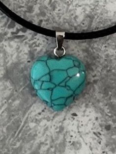 Teal turquoise stone heart pendant rope necklace.  Add a touch of elegance to your wardrobe with this beautiful necklace. Handmade with love to elevate any look.  The black rope is 20 inch in length and fastens with a lobster clasp. lovely stone heart dangle pendant. Free shipping to UK buyers. dispatched within 1-3 days but I aim to post the next day.  Presented on a gift card and wrapped beautifully in luxury tissue paper and a blush pink organza bag so makes the perfect gift.  If you aren't completely in LOVE with your purchase, please let me know and you'll receive a stress free refund. Customer satisfaction is my number one priority.  These are perfect for any occasion and outfit. Thank you for viewing. Please ask any questions, I am always available to help.  Thank you for supporting Casual Handmade Heart Necklace, Casual Heart-shaped Necklace For Gift, Casual Necklace With Heart Charm, Casual Heart Charm Necklace For Gift, Casual Heart Pendant Necklace Gift, Casual Heart Necklace With Heart Pendant, Casual Heart Charm Necklace As Gift, Casual Heart Charm Necklace Gift, Trendy Turquoise Necklace For Gift