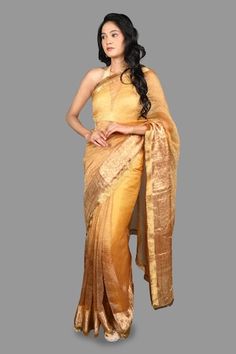 Golden pure tissue silk saree with floral brocade border and tassel detailing. Paired with unstitched blouse piece. - Aza Fashions Formal Cutdana Pre-draped Raw Silk Saree, Silk Dupatta For Formal Navratri Occasion, Silk Dupatta For Formal Navratri Festival, Raw Silk Formal Blouse Piece For Diwali, Silk Dupatta For Formal Wear During Navratri, Formal Raw Silk Blouse Piece For Diwali, Formal Raw Silk Blouse For Diwali, Formal Silk Dupatta For Navratri, Bollywood Style Formal Traditional Wear In Slub Silk