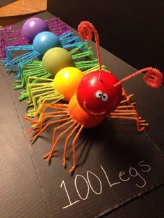 a very cute looking toy made to look like a caterpillar with lots of balls