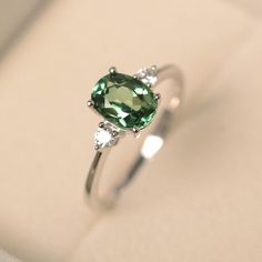 Green sapphire ring sterling silver engagement ring oval | Etsy Green Diamond Ring Silver, Green Oval Ring, Green Stone Ring Silver, Silver Rings With Green Stones, Green Diamond Ring Engagement, Green Saffire Engagement Ring, Sapphire Green Engagement Ring, Silver Green Engagement Ring, Silver And Green Wedding Ring