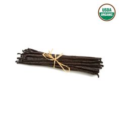 an image of vanilla sticks on a white background with the label for usa organic's chocolate