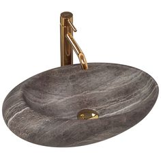 a bathroom sink with a gold faucet and marble bowl