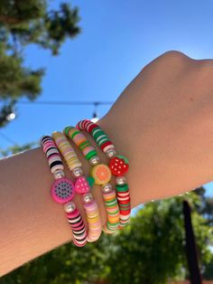 ~Handmade clay Beaded Bracelet 🍉 ~dragon fruit, red strawberry, orange, & pink stawberry bracelets with pearls ♡ ~The string is 6 1/2 inches although I can customize larger or smaller sizes.   (if you want a different size message me the size when ordering) 🍉 ~Stretchy string to fit perfectly around your wrist  ♡   ~Comfortable fit  🍉 ~Can be worn daily  ♡ ~⚠️Would not recommend wearing these in the water⚠️ Dragon Fruit Clay Bead Bracelet, Strawberry Clay Bead Bracelet, Novelty Pink Friendship Bracelets With Round Beads, Pink Fun Jewelry With Fruit Design, Fun Pink Jewelry With Fruit Design, Fun Pink Fruit Design Jewelry, Pink Beaded Novelty Friendship Bracelets, Novelty Pink Beaded Friendship Bracelets, Novelty Pink Beaded Bracelets With Colorful Beads