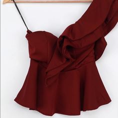 Wine Colored Fit And Flare One Shoulder Top. Has Chest Padding Sewn In. Never Worn Chic Burgundy Tops For Party, Chic Burgundy Party Top, Elegant Burgundy Sleeveless Top, Red Ruffled Tops For Evening, Lace Trim Cami Top, Brown Bodysuit, Mock Neck Bodysuit, Lace Trim Cami, Rayon Shirt