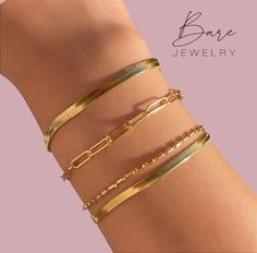 "18k Gold Filled Rectangle Paperclip Chain Bracelet | Herringbone Bracelet | Link Chain Bracelets For Women Closure: Lobster clasp Material : 18k Gold Filled Bracelet length: Adjustable MEASUREMENT Paperclip 7 Inches Herringbone: 6\" + 2\"  (Adjustable from 6\" to 8\") Herringbone + Mini Beans (2 in 1) : 6\" + 2\" (Adjustable from 6\" to 8\") These bracelets can be worn with any outfit, looks great stacked with other bracelets, and will be a great heirloom piece to cherish for years to come. Perfect for any occasion.  This is Nickel and Lead-free and is good for those with sensitive skin and this jewelry is hypoallergenic. We offer FREE shipping for all USA orders." Trendy Tarnish Resistant Rectangular Bracelets, Rectangular Paperclip Bracelet Gift, Trendy Gold Rectangular Paperclip Bracelet, Dainty Tarnish Resistant Rectangular Bracelet, Dainty Gold Rectangular Chain Bracelet, Dainty Rectangular Tarnish-resistant Bracelet, Gold Rectangular Paperclip Bracelet With Adjustable Chain, Dainty Tarnish-resistant Rectangular Bracelet, Gold-tone Paperclip Chain Bracelet For Formal Occasions