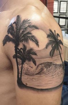 a man with a palm tree and wave tattoo on his arm