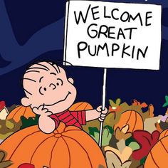 a cartoon character holding a sign that says welcome great pumpkin in front of a field of pumpkins