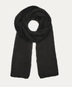 Designed in Copenhagen and made in Italy. Lisa mohair scarf is generously sized, so you can wear it over your shoulders as a wrap or doubled-up around your neck giving you a snug, cozy feeling The luxurious scarf has been designed with the "Mila" beanie in matching colors. Style it with or without the Mila mohair beanie. The size is simply one size, fits all. Made in Italy with 78% mohair, 18% polyamide, 4% wool. Hand-wash only in cold water with wool detergent. Do not tumble dry. Lay flat to dr Black Alpaca Shawl For Winter, Mohair Shawl Scarf For Winter, Winter Mohair Scarves, Mohair Beanie, Winter Mohair Shawl Scarf, Mohair Scarf, Black Scarf, Matching Colors, Cozy Feeling