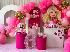 a barbie birthday party with balloons and decorations