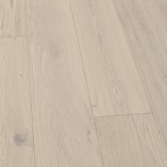 an image of wood flooring that looks like it has been painted in light grey