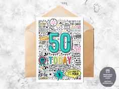 a greeting card with the words 50 today printed on it and an envelope in front