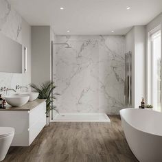 a large bathroom with marble walls and floors