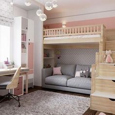 a bedroom with bunk beds, desk and stairs to the second floor is decorated in pastel colors