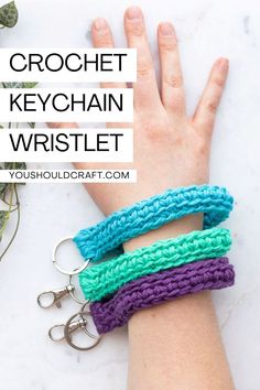 the crochet keychain wristlet is made with two different colored yarns