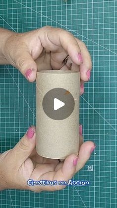 two hands holding a roll of toilet paper