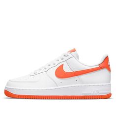 The Nike Air Force 1 '07 'White Team Orange' is a classic silhouette with a modern twist. Featuring a clean white leather upper, paired with matching tongue, laces, lining and midsole. Accented with orange detailing covering the Swoosh, heel tab, branding area and rubber outsole, this sneaker is perfect for any occasion. Inspired by the classic Air Force 1 series, this sneaker is a must-have for any sneakerhead. With its timeless design and comfortable fit, this sneaker is perfect for everyday wear. (AF1/SNKR) White Leather Nike Air Force 1 For Streetwear, Classic Nike Air Force 1 Low-top With White Sole, Classic White Custom Sneakers For Light Sports, Classic Nike Air Force 1 With White Sole, White Nike Air Force 1 Leather Classic Style, Modern White Nike Air Force 1 In Leather, Classic White Low-top Nike Air Force 1, Classic Leather Nike Air Force 1 With White Sole, Modern White Leather Nike Air Force 1