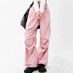 𝔇𝔢𝔱𝔞𝔦𝔩𝔰: Style: Kawaii Goth, Harajuku, Streetwear Materials: Spandex Quantity: 1 pc An oversized cargo pants with a twist - this time in soft pink. These pants feature a trendy ruffled design and blush hue that will keep you style-forward all day long. It's easy to style. It's also practical to wear with pockets, a drawstring at the bottom, and our elastic waistband. Enjoy free shipping with a purchase of over 80$ SIZE WAIST HIP LENGTHS 27-33 in 40 in 40 inM 29-35 in 42 in 40 inL 31-37 in Oversized Cargo Pants, Pink Cargo Pants, Goth Harajuku, Drawstring Cargo Pants, Style Kawaii, Kawaii Goth, Harajuku Streetwear, Crop Top Sweater, Swimwear Outfit