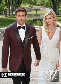 a man in a tuxedo and a woman in a white dress holding hands