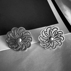 Our jewellery features the timeless chrysanthemum pattern--a common motif in traditional Chinese culture. By incorporating this exquisite pattern, our pieces transcend mere ornamentation, becoming powerful symbols of cultural heritage. Discover the essence of Chinese tradition elegantly captured in each piece. Let the chrysanthemum pattern not only adorn you but also tell a story of rich cultural significance. Embrace the beauty of heritage with our classic and memorable jewellery. Size:  2.4*2. Memorable Jewelry, Earrings Handmade Silver, Handmade Silver Earrings, Powerful Symbols, Charms Earrings, Silver Earrings Handmade, Best Gift Ideas, Chinese Culture, Cultural Heritage