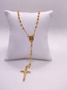 "14K 3MM Disco Bead Rosary -Solid 14K Yellow Gold -Beautiful beaded design -The length on this one is 18\" Inches + 4\" inches that dangles w/Cross -See reference pictures for measurements -Nice and sturdy Lobster Clasp -Great for daily wear or special occasions -Really nice gift for that special someone -Complete rosary necklace can be used to Pray (Message us if you have any other questions)" Gold Single Strand Dangle Jewelry, Gold Spiritual Necklace With Dangling Beads, Spiritual Gold Necklace With Dangling Beads, Adjustable Gold Lariat Necklace With Dangling Beads, Gold Lariat Necklace With Dangling Beads For Gifts, Gold Beaded Lariat Necklace With Dangle, Gold Beaded Dangle Lariat Necklace, Luxury Gold Beaded Necklaces With Beaded Chain, Yellow Gold Jewelry With 8mm Beads