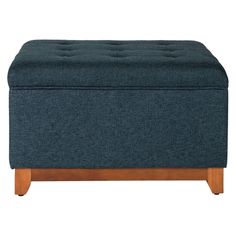 a blue ottoman sitting on top of a wooden frame