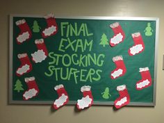 a green board with red and white stockings hanging from it's sides that says final exam stocking stuff