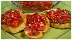 three pieces of bread topped with tomato relish and garnish