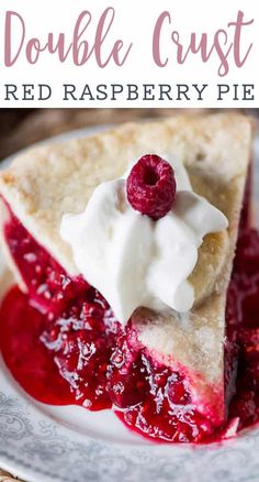 a slice of raspberry pie with whipped cream on top