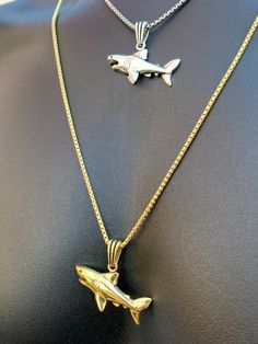 "Amazing Custom Made One of a Kind Sterling Silver Shark pendants! Solid 925 sterling silver We have 2 styles! Rhodium finished & 14k yellow gold finished! Gold is vermeil bonded to solid silver underneath so color wont fade or tarnish Both are oxidized (blackened to give a more vintage look) Pendant measures roughly 1.5\" by 1\"...weighs roughly 6 grams! 100% 925 silver...not plated or filled...will NEVER TARNISH OR CHANGE COLOR Stamped 925 You can buy pendant only or with choice of 18-30\" Sterling Silver Cuban Link Jewelry For Gift, Polished Finish Cuban Link Necklace Gift, Gift Cuban Link Sterling Silver Necklace, Sterling Silver Curb Chain Jewelry Gift, Sea Jewellery, Shark Pendant, Silver Shark, Shark Earrings, Red Stone Ring