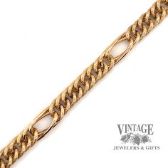 14 karat yellow gold 7.5" hollow link bracelet. The textured finish on the links of this bracelet add to it's charm. Coupled with the bright finish elongated and slightly twisted double link connecting sections, this estate bracelet has style not recently seen in current designs. 14k Gold Bracelet With Curb Chain Oval Link, 14k Gold Bracelet With Oval Link Curb Chain, Vintage 14k Gold Chain Link Bracelet, Formal Gold Curb Chain Link Bracelet, Yellow Gold Figaro Chain Bracelet With Rectangular Links, Yellow Gold Figaro Chain Bracelet, Formal Gold Figaro Chain Bracelet, Formal Gold Curb Chain Bracelet, Formal Figaro Chain Link Bracelet