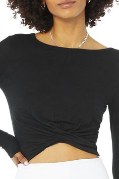 Prepare to walk the walk in the Cover Long Sleeve Top. The cropped slim fit silhouette, sweet front wrap detail and ribbed sleeves make it on-trend and on-point. Layer it over your favorite Alo bra for an easy, studio-to-street transition. Cropped fit with wrap front Ribbed long sleeves Designed & uniquely fit to flatter every size Wear-tested by our in-house team for the perfect fit Cover Long Sleeve Top in Black, Size: Medium | Alo Yoga® The Walk, Back Women, Alo Yoga, Yoga Wear, Steel Blue, Sleeve Designs, Bra Tops, Long Sleeve Top, Walk In