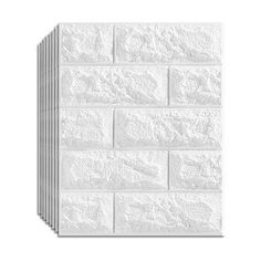 a white brick wall that is made out of bricks