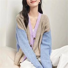 This is perfect for those who are looking for a clothing for a good price. It is fashionable, stylish, and it will look great on anyone who wears it. Do you wanahavit? SIZE bust:108cm sleeve length:47cm length:60cm Note: 1 inch = 2.54 cm, 1 cm = 0.39 inch Measurement by hands allow 2-3cm errors which is normal Trendy Winter Cardigan With Contrast Color, Trendy Blue Patchwork Sweater, Winter V-neck Cardigan With Patchwork, Knit Long Sleeve Outerwear With Color Matching, Long Sleeve Knit Patchwork Cardigan, Patchwork Sweater For Spring Layering, Spring Patchwork Sweater For Layering, Color Block Long Sleeve Cardigan For Winter, Winter Knit Cardigan With Color Matching