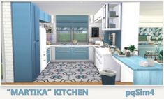 the interior of a blue and white kitchen