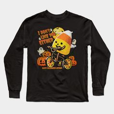 a black long sleeve shirt with an image of a pumpkin riding a bike