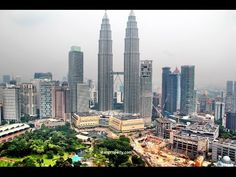 an aerial view of some very tall buildings