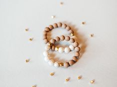 * If you love big, chunky beads- this is the bracelet for you! * Handmade in North Carolina * Features white turquoise for a simple, classic look * Choose your own size!  * Rosewood beads can be used for diffusing * One bracelet per order Click to see our other rosewood styles: https://www.etsy.com/shop/KelseyOBrienDesigns?ref=seller-platform-mcnav&section_id=38759716 --SIZING-- *We recommend sizing up one size for this bracelet! Choose your desired size from the drop down menu. We want you to feel comfortable while wearing your pieces! If you would like a different size, please make a note at checkout or message us. We will help you find the perfect fit. --BEADS-- * 10mm unfinished rosewood beads * 10mm white turquoise * Gold accent beads --HOW TO USE WITH ESSENTIAL OILS-- To use your ros Everyday White Stretch Bracelet With Large Beads, White Wooden Beads Stretch Bracelet As Gift, White Stretch Bracelet With Wooden Beads For Gift, White Wooden Beads Stretch Bracelet Gift, White Wooden Beads Bracelet, White Turquoise Jewelry, Single Bead, Chunky Beads, Diffuser Bracelets