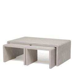 two concrete tables sitting on top of each other