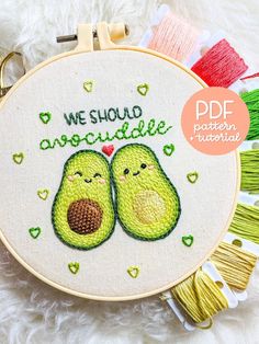 two avocados with the words we should love each other in green and yellow