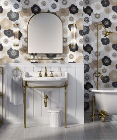 the bathroom is decorated in black and white flowers, with gold accents on the wall