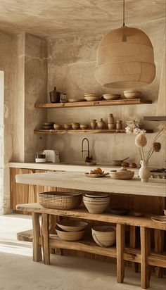 the kitchen is clean and ready to be used for cooking or baking, with wooden shelves on either side